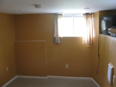 Dark Orange Paint Color in the Basement Bedroom