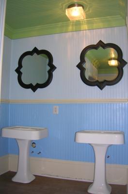 Example of colors, antique sinks, custom mirrors and pine wide plank flooring