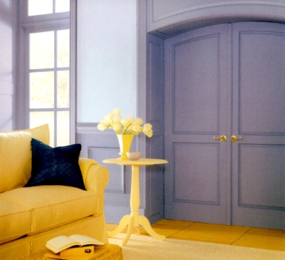 Lavender color woodwork with pale violet walls and yellow furniture and decor