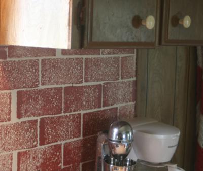 Faux brick finish created with a kitchen sponge