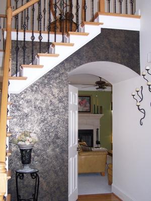 Black accent wall with a sponged-on finish