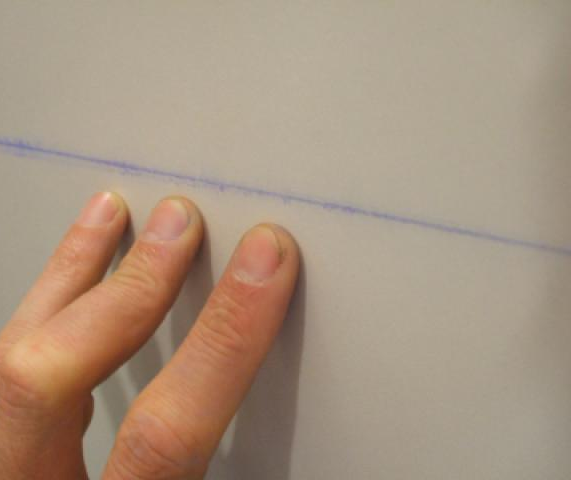 A blue guide line created by chalk