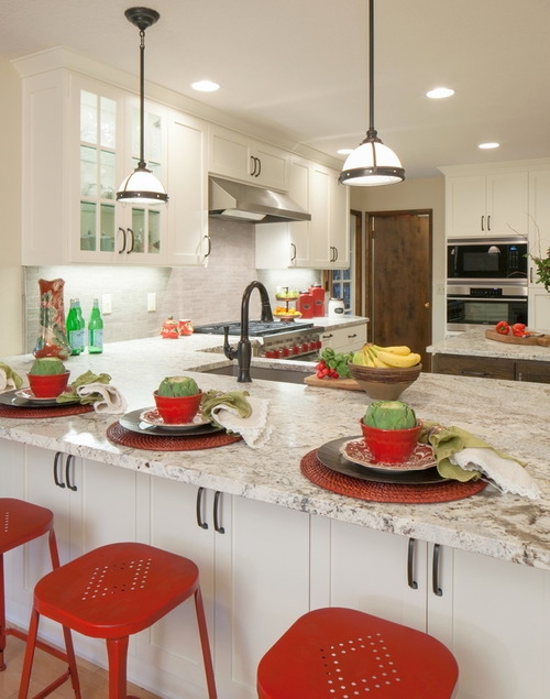 White kitchen with pops of red, green and yellow colors