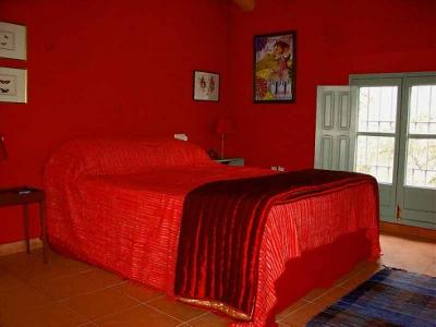 My bedroom painted and decorated in shades of red