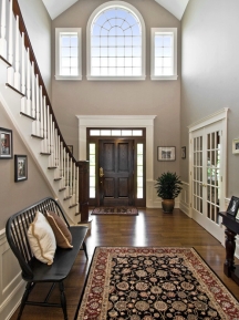 With decorative interior painting tricks, you can make a foyer look more inviting