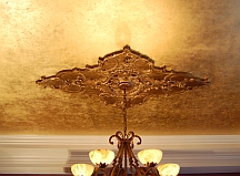 Gilded ceilings make a room look like a palace