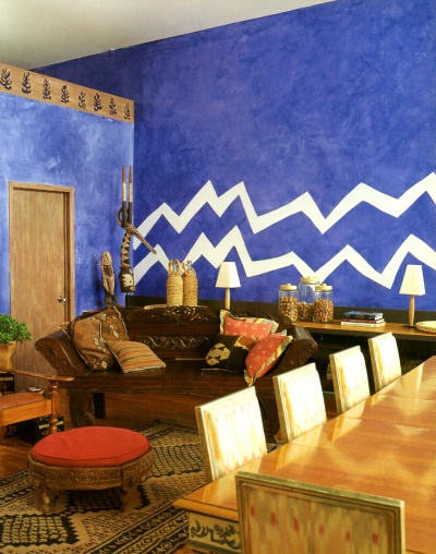 Royal blue ragged paint finish decorated with a zigzag border on one accent wall