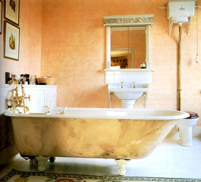 Rag painted faux finish on a bathtub made to look like marble