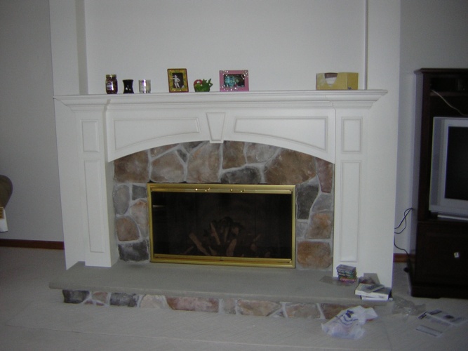 Before: white painted fireplace