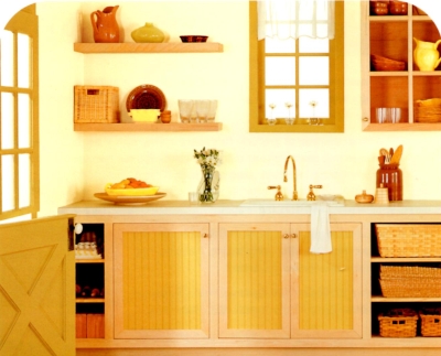 Mustard yellow trim in an earthy kitchen color palette