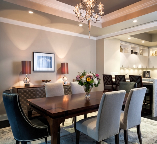 Contemporary dining room painted in different shades of taupe