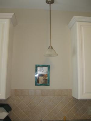 Kitchen wall area above the sink