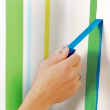 Remove the tape by pulling at it at an angle Remove the tape by pulling at it at an angle