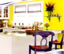 Neon yellow is an aggressive paint color but can work in a busy kitchen