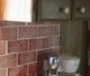 Faux brick finish created with a kitchen sponge