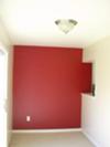 Vibrant red statement wall in my breakfast nook