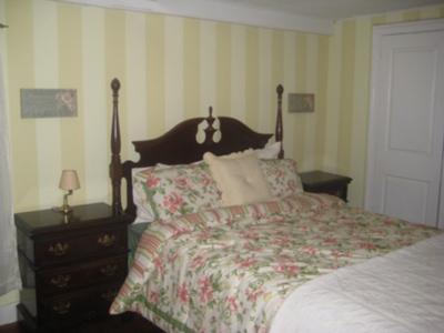 Wide vertical stripes on the walls of our spare bedroom