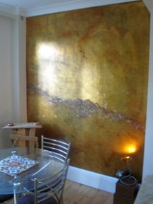 Metallic paint finishes can be combined for unique accent wall designs