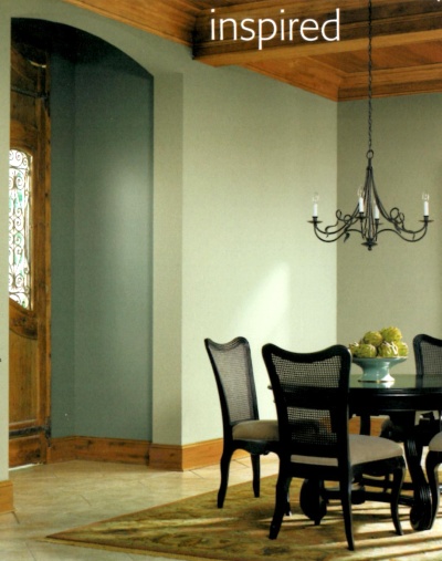 Stained woodwork with sage green walls