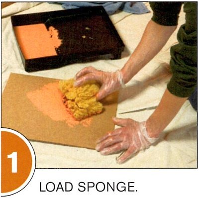 Remove excess glaze by blotting the sponge