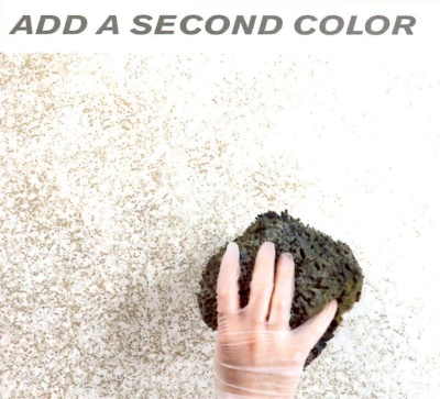 Add the second glaze color by dabbing it over the first one