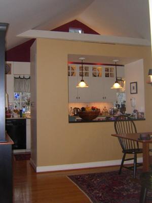 Open kitchen / dining room area painted different colors