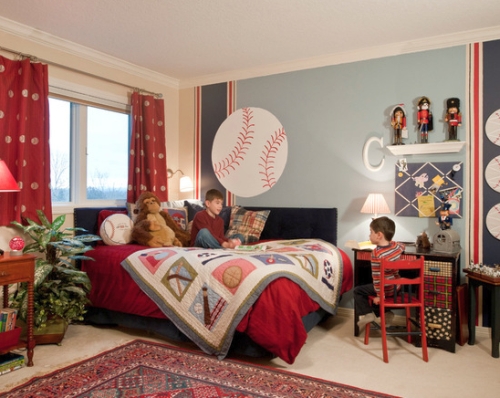 Kids' bedroom painted and decorated in blue and red