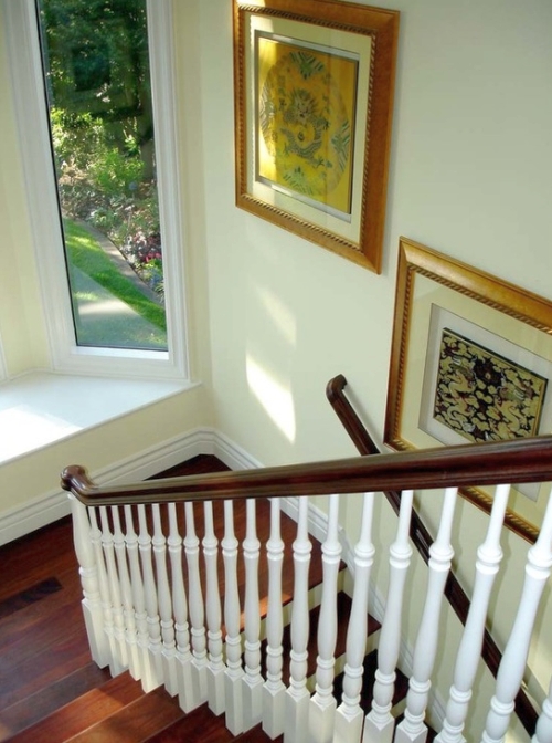 Foyer painted a pastel yellow-green color