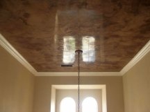 Burnished venetian plaster makes ceilings look like stone