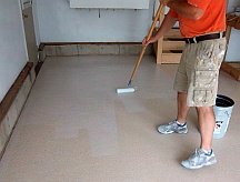 Applying protective sealer to the floor