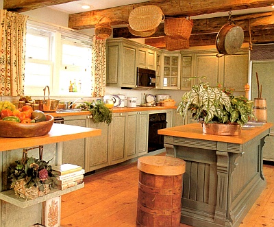 Rag painted kitchen cabinets in historic colors create a country look and feel