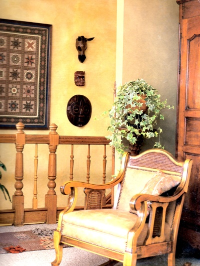 Airy yellow ragged off paint finish on hallway walls