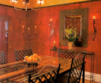 Rich red dining room walls painted with a ragged off finish