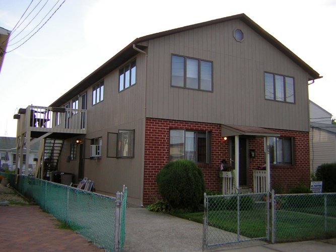 After: solid stain in a lighter color on paneling