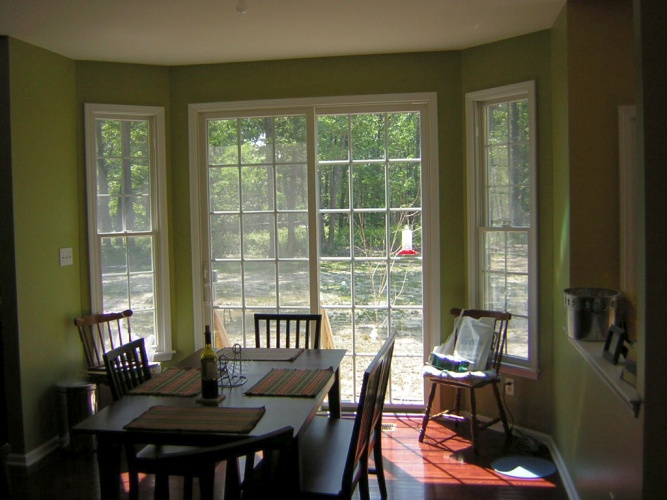 After: green paint color enhances flooring