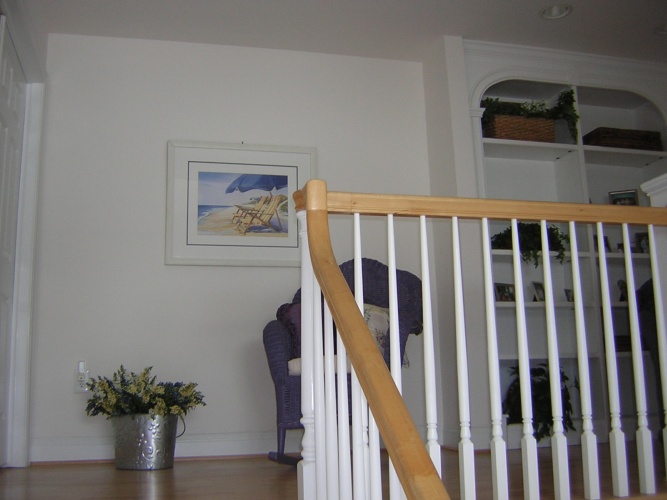 Before: white hallway walls