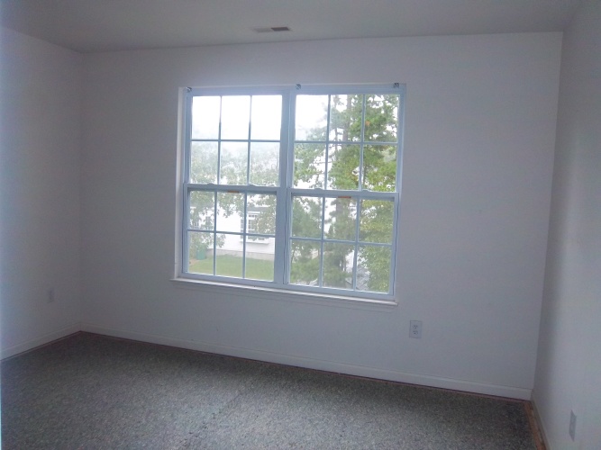 Before: unpainted dining room