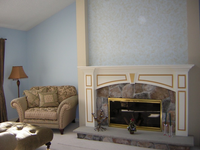 After: sponging and metallic paints make fireplace a focal point
