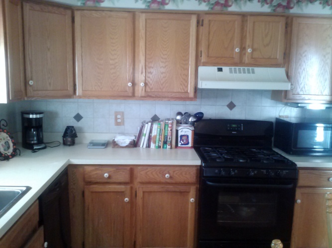 Before: outdated cabinet color