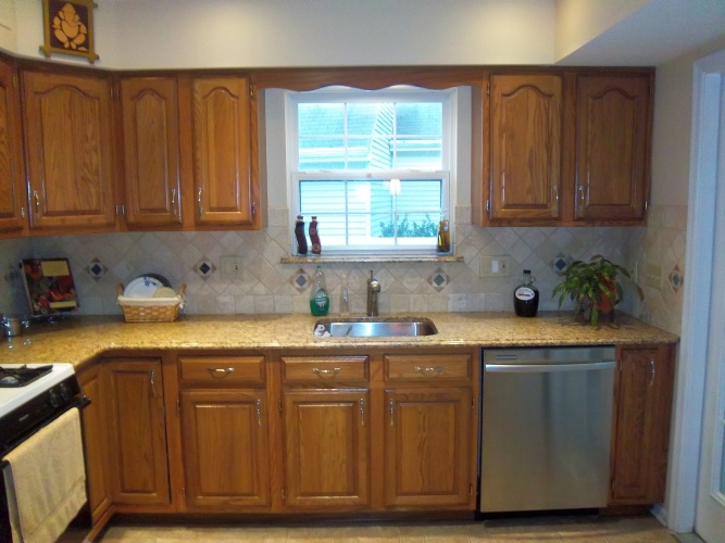 Before: dated cabinet finish