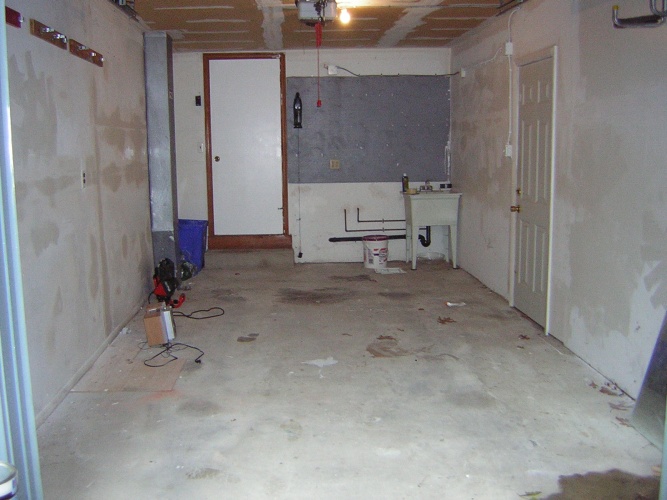 Before: dirty garage floor