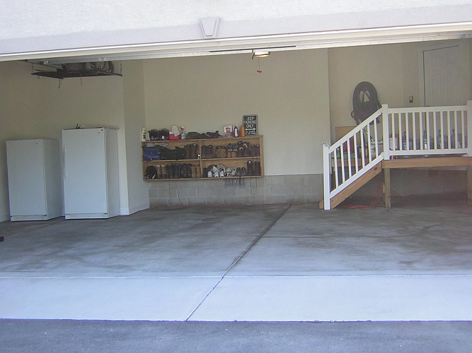 Before: typical unpainted garage floor