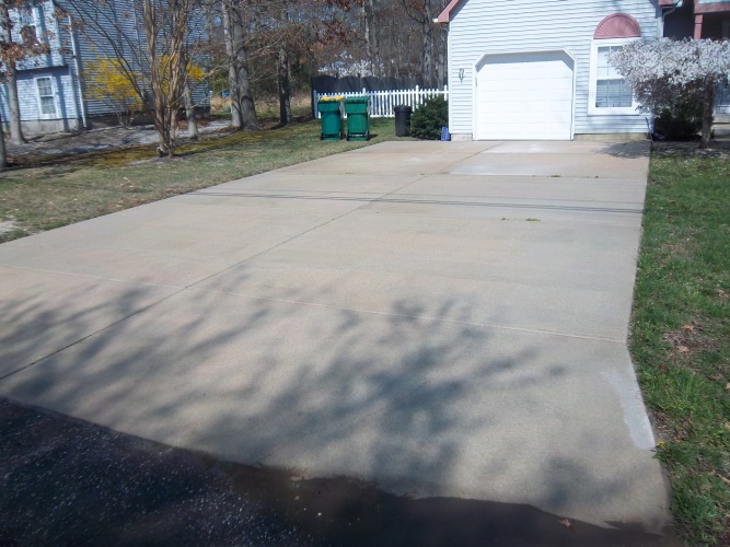 After: power washed driveway