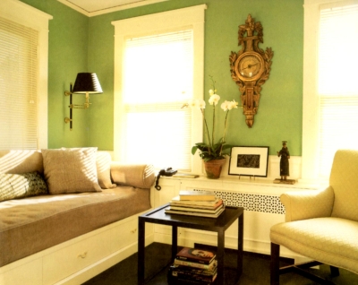 Yellow trim paired with warm green wall color