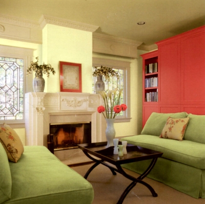 Beige antique woodwork paired with bright yellow and pink wall colors