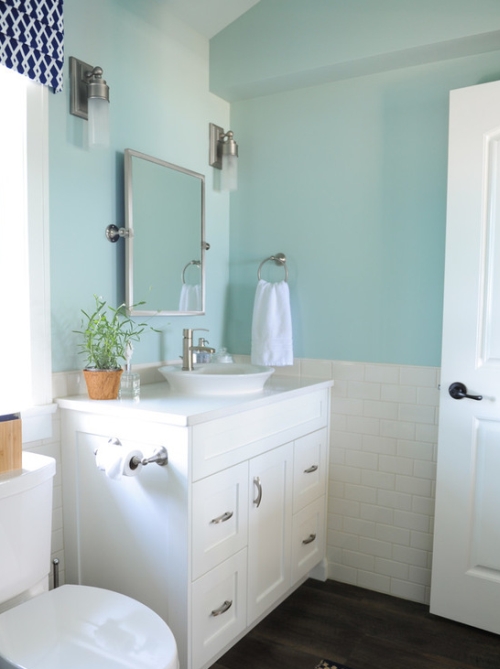 White bathroom painted a turquoise / aqua color
