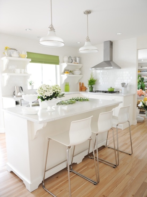 White kitchen decorated with green and yellow
