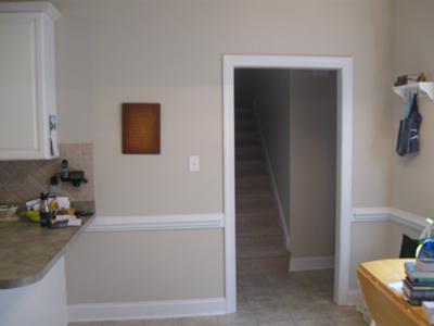 Kitchen leading into the short hallway