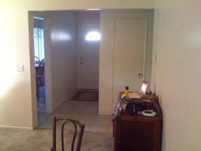 Dining room looking towards the front door entry 