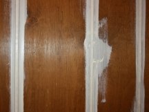 caulk and fill holes before painting woodwork